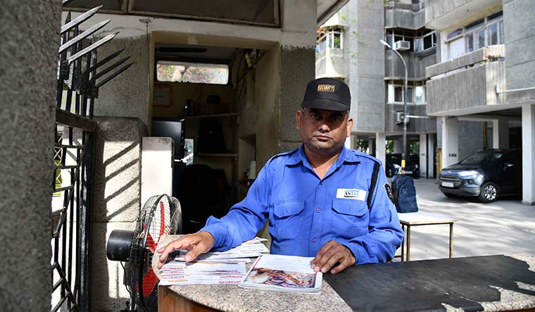 Hoping for the best: Mahendra Pal Singh, a security guard in Delhi, is keen on buying LIC shares | Sanjay Ahlawat