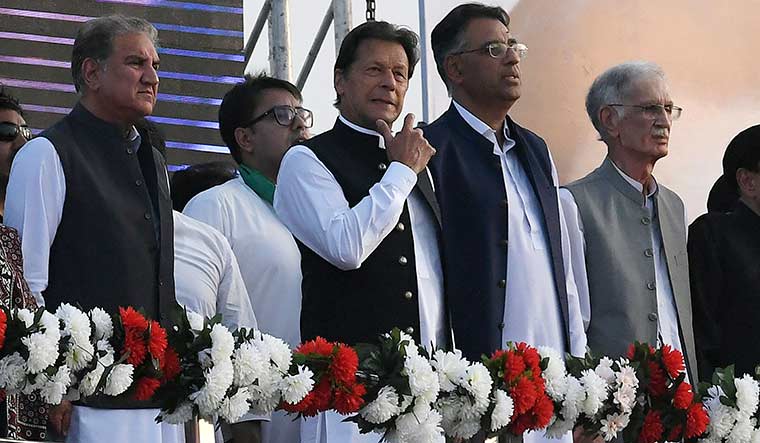 In for a long spell: Imran at a Pakistan Tehreek-e-Insaf rally in Islamabad on March 27  | AFP