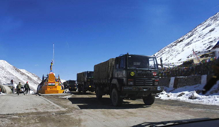 Ready to rumble: Indian Army trucks at Chang La, one of the highest mountain passes in the world, on their way to the China border.