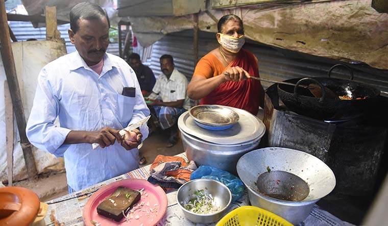 Change of fortune: Natarajan’s parents at their chicken pakoda stall | R.G. Sasthaa