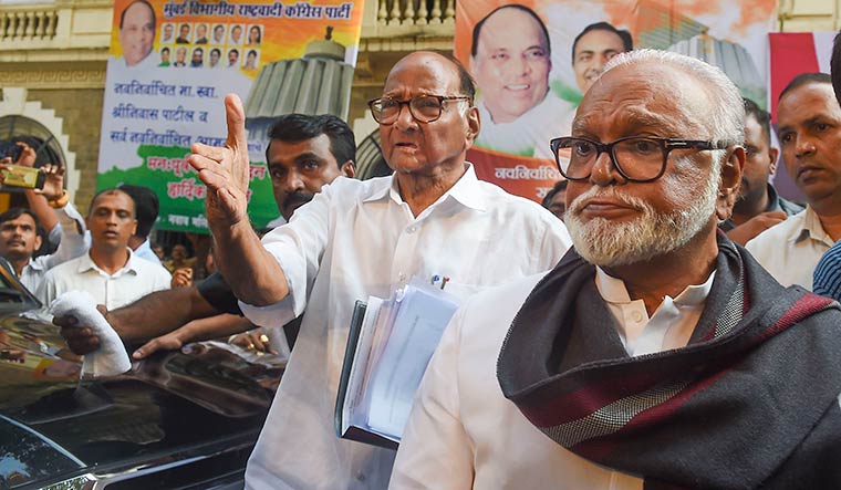 Switch hit: NCP leader Chhagan Bhujbal with party chief Sharad Pawar | PTI