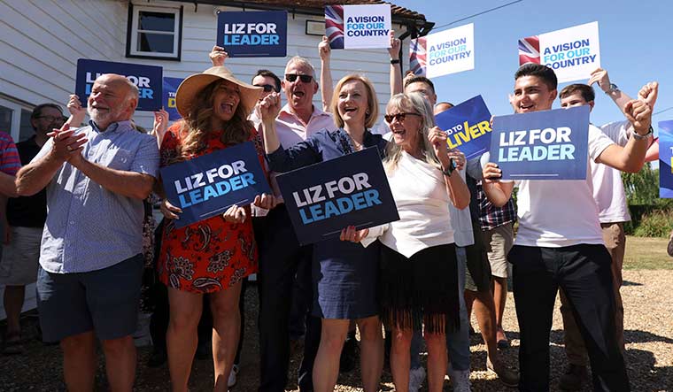 Leading lady: Truss with supporters at a campaign event in Kent | AP