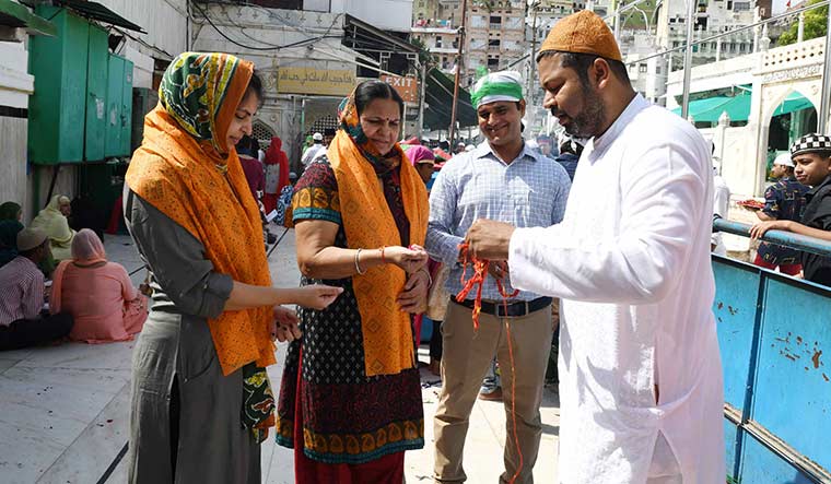 Seeking solace: Nishtha Modi (first from left) along with her family at the dargah | Sanjay Ahlawat