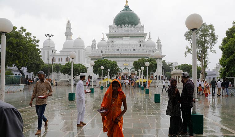 One God, many names: Pammi Devi, a Hindu woman, after offering prayers at the shrine of Haji Waris Ali Shah in Lucknow | Pawan Kumar