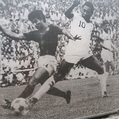 Brush with greatness: Sarkar tries to stop Pele from getting the ball in the 1977 match between NY Cosmos and Mohun Bagan.
