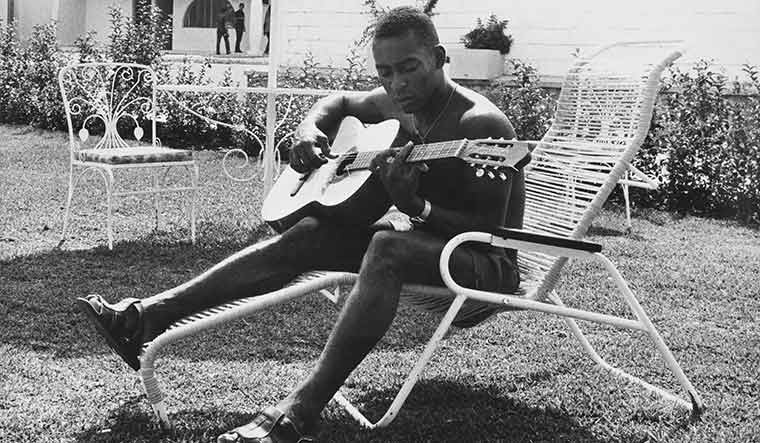 On song, always: Pele relaxing with his guitar during the World Cup in Mexico, 1970 | Getty Images