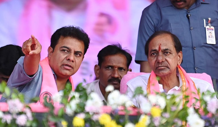 Leaning on family: KCR (right) with son, K.T. Rama Rao.