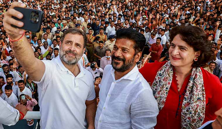 A new dawn: (From left) Rahul Gandhi, Revanth Reddy and Priyanka Gandhi Vadra | PTI