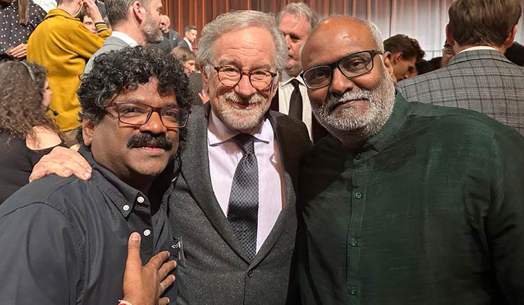 Meeting a master: (From left) Chandrabose, Steven Spielberg and Keeravani at the Oscars.
