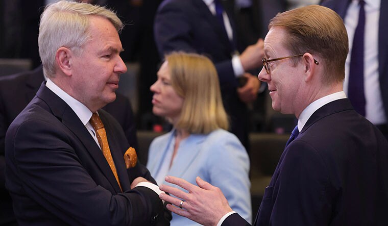 Talking point: Finland’s Foreign Minister Pekka Haavisto (left) with Sweden’s Foreign Minister Tobias Billstrom during a meet of NATO foreign ministers at NATO headquarters in Brussels on April 5 | AP
