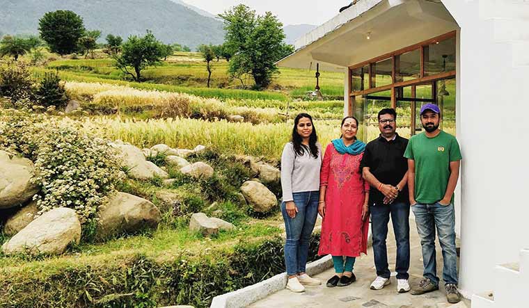 Home, work: Suraj Dikonda with family at AVVA cafe in Bir, Himachal Pradesh.