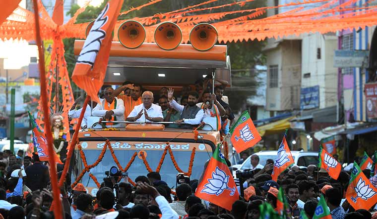 Mass appeal: Yediyurappa with C.T. Ravi (waving) and other BJP leaders at an election rally in Chitradurga | Bhanu Prakash Chandra 