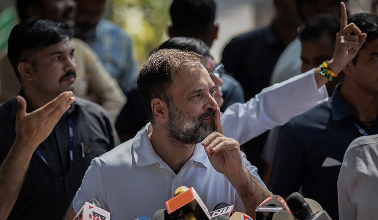 Silencing critics: Congress leader Rahul Gandhi speaks to journalists in Delhi after the Congress victory in Karnataka | Reuters