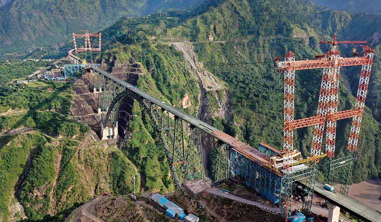 Flying high: The chenab bridge, the world's highest rail arch bridge, is one of the major achievements of the modi government | PTI