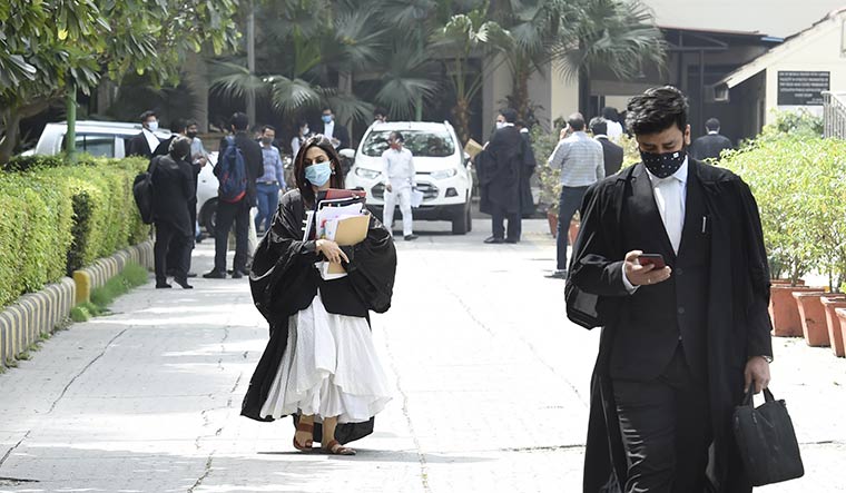 The court is in session: Lawyers at the Delhi High Court after in-person hearings resumed in March 2021. Since Covid lockdown, 2.63 crore virtual hearings have been held by all courts in India | Getty Images