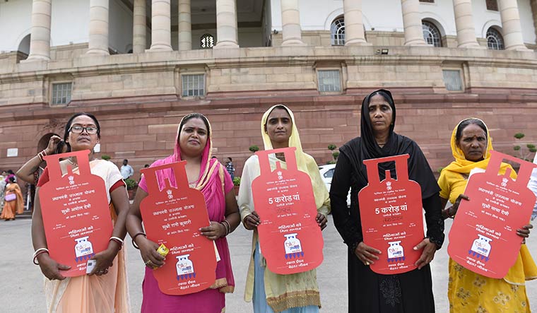 Power on: Beneficiaries of the Pradhan Mantri Ujjwala Yojana in Delhi | Getty Images