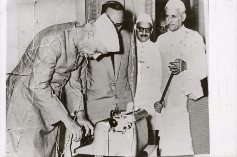 Keys to the future: Prime minister Pandit Jawaharlal Nehru types on the Godrej all-Indian typewriter at the Raj Bhavan in Madras during the Avadi Congress session in 1955 | Godrej Archives