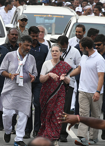 In lockstep: Shivakumar with Sonia Gandhi and Rahul Gandhi during the Bharat Jodo Yatra in Mandya district | PTI
