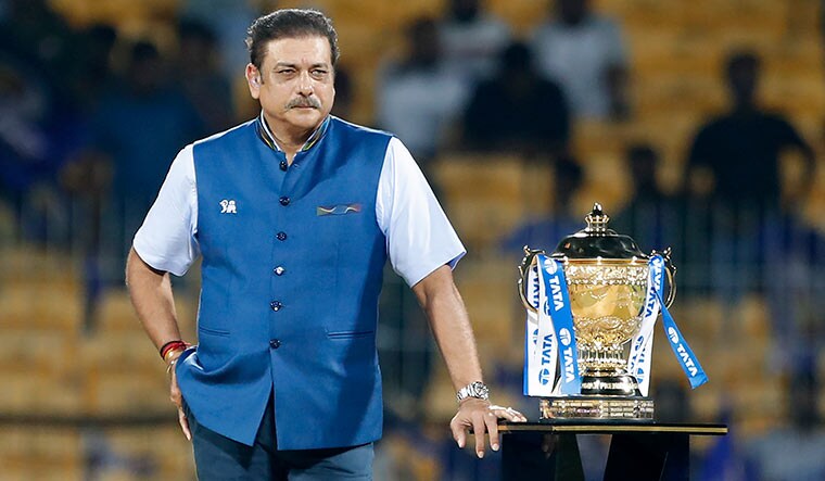 Man with the mic: Shastri with the IPL trophy; he returned to commentary after his coaching stint | Getty Images