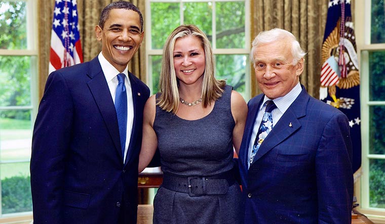 In great company: Christina Korp with Barack Obama (left) and Buzz Aldrin on the 40th anniversary of the Apollo 11 mission in 2009.
