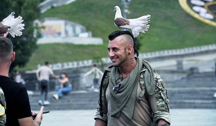63-a-pigeon-is-perched-on-the-head-of-Sherif