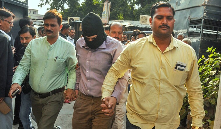 ’Spy’der web: BrahMos Aerospace engineer Nishant Agarwal being taken to court by Uttar Pradesh ATS officers in Lucknow. Nishant was allegedly hooked by the same ISI handlers who honeytrapped BSF constable Achyutanand Mishra | PTI