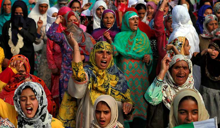 Anger, unveiled: women take out a protest march after friday prayers in srinagar on october 11 | Reuters
