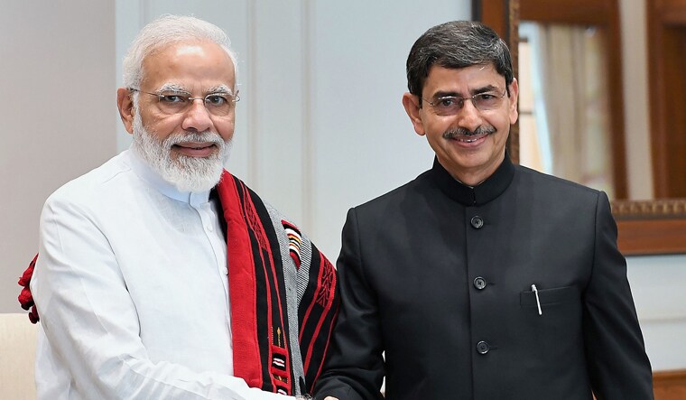 Piecing together peace: Prime Minister Narendra Modi with interlocutor and Nagaland Governor R.N. Ravi