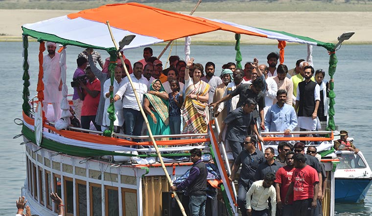 Hand’s on deck: Priyanka waves to supporters as she ends her boat ride at Varanasi | Sanjay Ahlawat