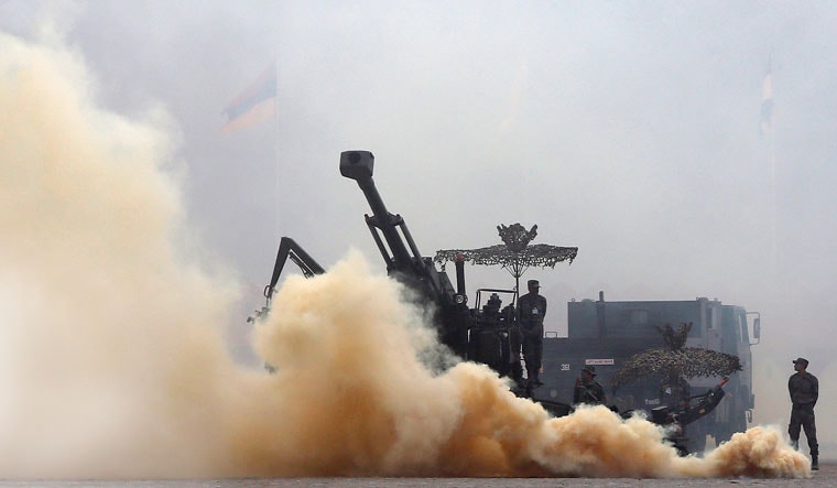 Power display: Soldiers participate in a mock drill during the Army Day parade in New Delhi. The Army, in a report, said that faulty ammunition supplied by ordnance factories had caused more than 400 accidents in the past six years | REUTERS
