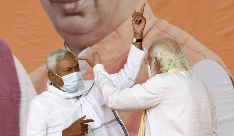 [File] Prime Minister Narendra Modi with former Bihar Chief Minister Nitish Kumar | PTI