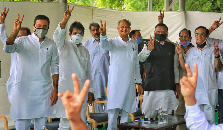 In the battle: Ashok Gehlot with Randeep Surjewala, K.C. Venugopal, Avinash Pandey and Ajay Maken during a meeting with party MLAs at his residence in Jaipur | PTI