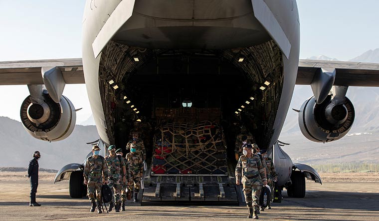 Call of duty: Indian soldiers disembark from a military transport plane at a forward airbase in Leh | Reuters