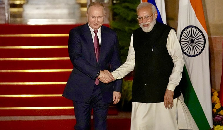 All-weather friends: Russian President Vladimir Putin with Prime Minister Narendra Modi before their meeting in Delhi | AP