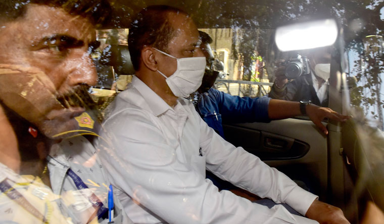 [File] Sachin Vaze being taken to the NIA court in Mumbai | Getty Images
