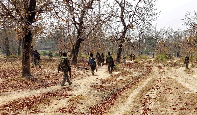 On guard: Security personnel patrol the area after the attack in Bijapur | Reuters
