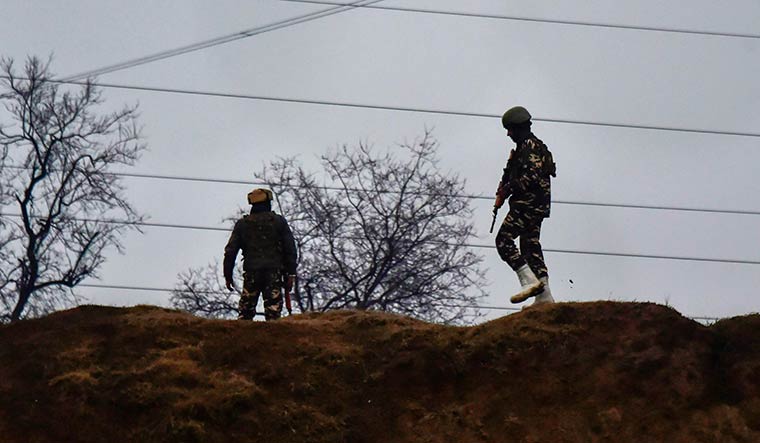 Tough job: Soldiers near the site of a suicide bomb attack at Lethapora Awantipora in Pulwama district | PTI