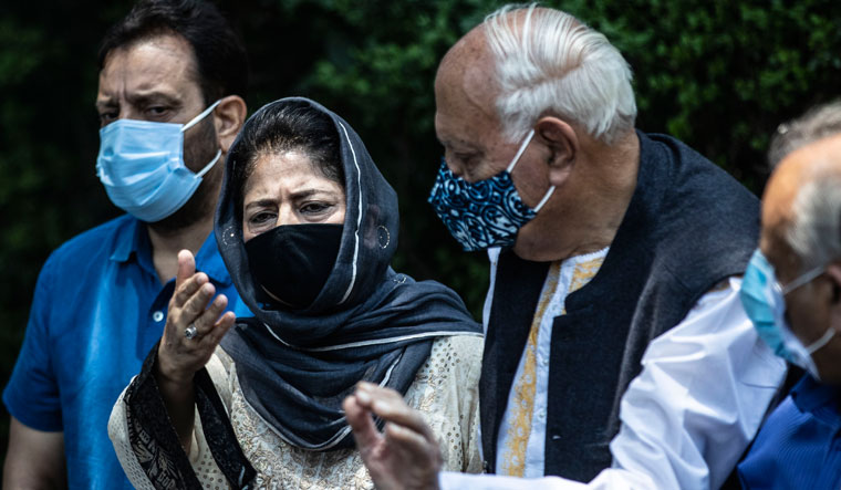 United front: NC president Farooq Abdullah and PDP president Mehbooba Mufti at a press conference of the Gupkar Alliance in Srinagar on June 22 | AP