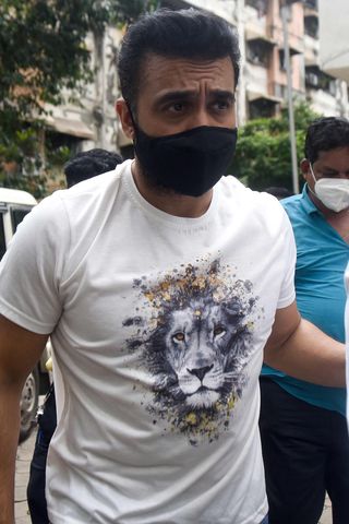 Caught in a web: Police escort Raj Kundra in Mumbai | AFP