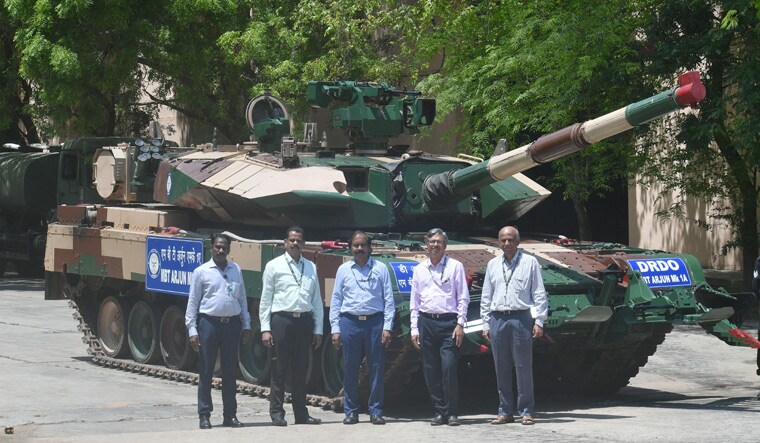 Ready to roll: CVRDE director V. Balamurugan (centre) with Team Arjun in front of the battle tank, in Chennai | Arvind Jain