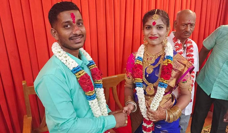 Bond, cut short: P. Mohan with Meenakshi at their wedding in June.