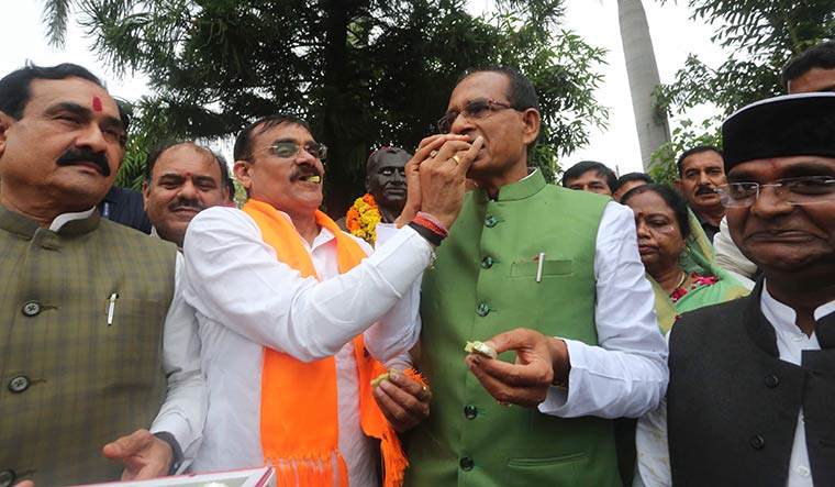 Bittersweet moment: Chief Minister Shivraj Singh Chouhan during BJP celebrations at the party headquarters in Bhopal.
