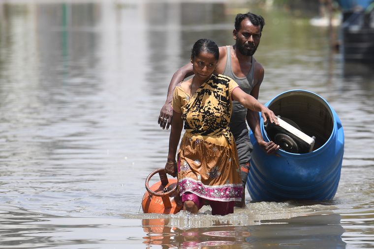 Fuelled by fear: People wade through rising waters in Bellandur | Bhanu Prakash Chandra