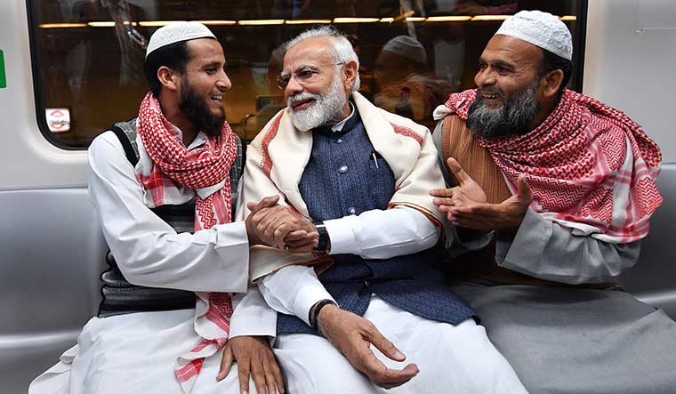 Time to engage: Modi has told the BJP cadre to improve relationships with minority communities | AFP