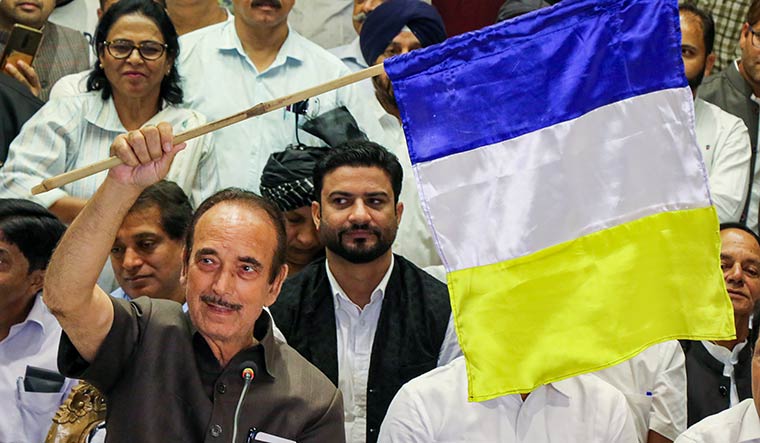 Failure to launch: Azad unveiling the DAP flag last September | PTI
