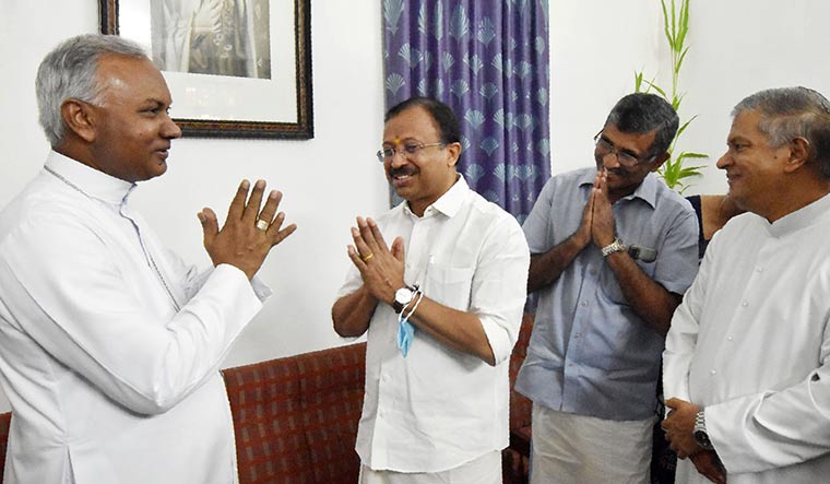 Winning combination: Union Minister V. Muraleedharan being welcomed by Archbishop Thomas J. Netto (far left). Minority Morcha state vice president Dani J. Paul and Father Eugine H. Pereira (far right) are also present.