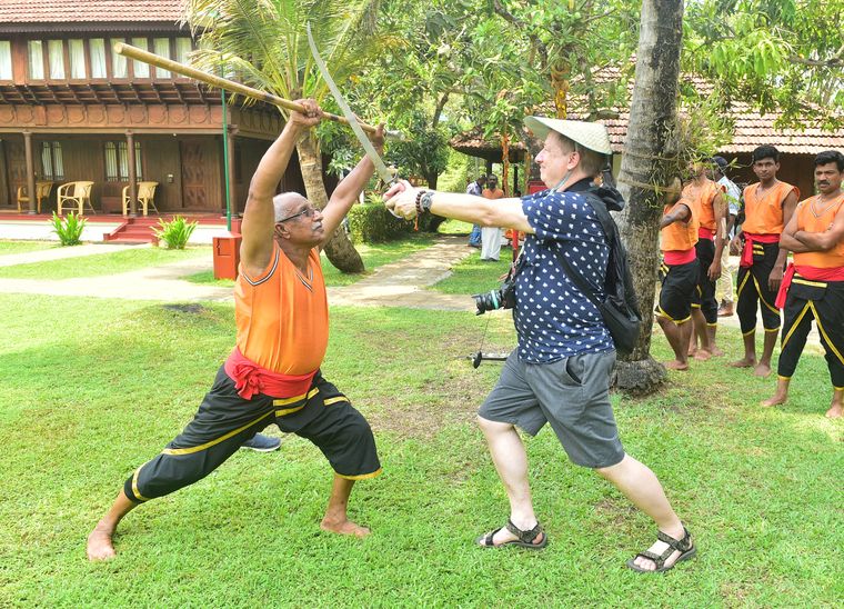 Deft move: A delegate tries kalaripayattu during the G20 sherpas’ meeting at Kumarakom | Rijo Joseph