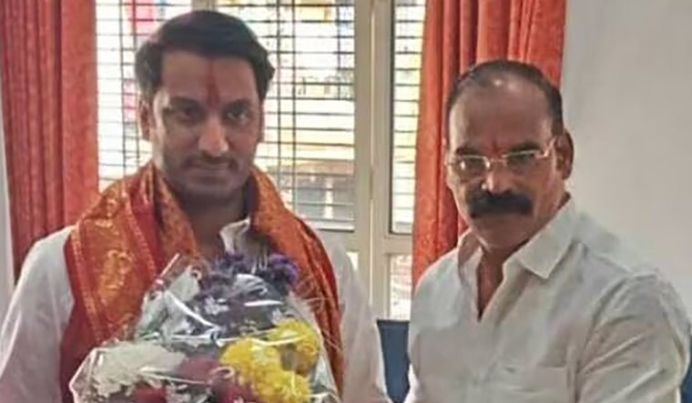 Bad company: Parth Pawar (left)with gangster Gajanan Marne in Pune.