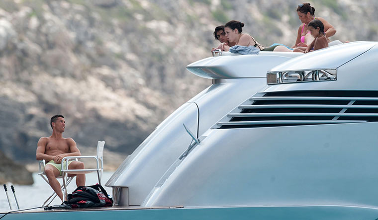 Chilling on deck: Football star Cristiano Ronaldo with family | Getty Images