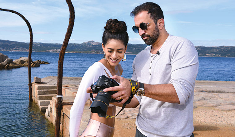 Glam World: Atul Kasbekar with model Diva Dhawan during the photoshoot at Sardinia.